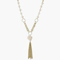 Long gold-plated necklace with freshwater pearls, chunky chain links, and flowing tassel pendant
