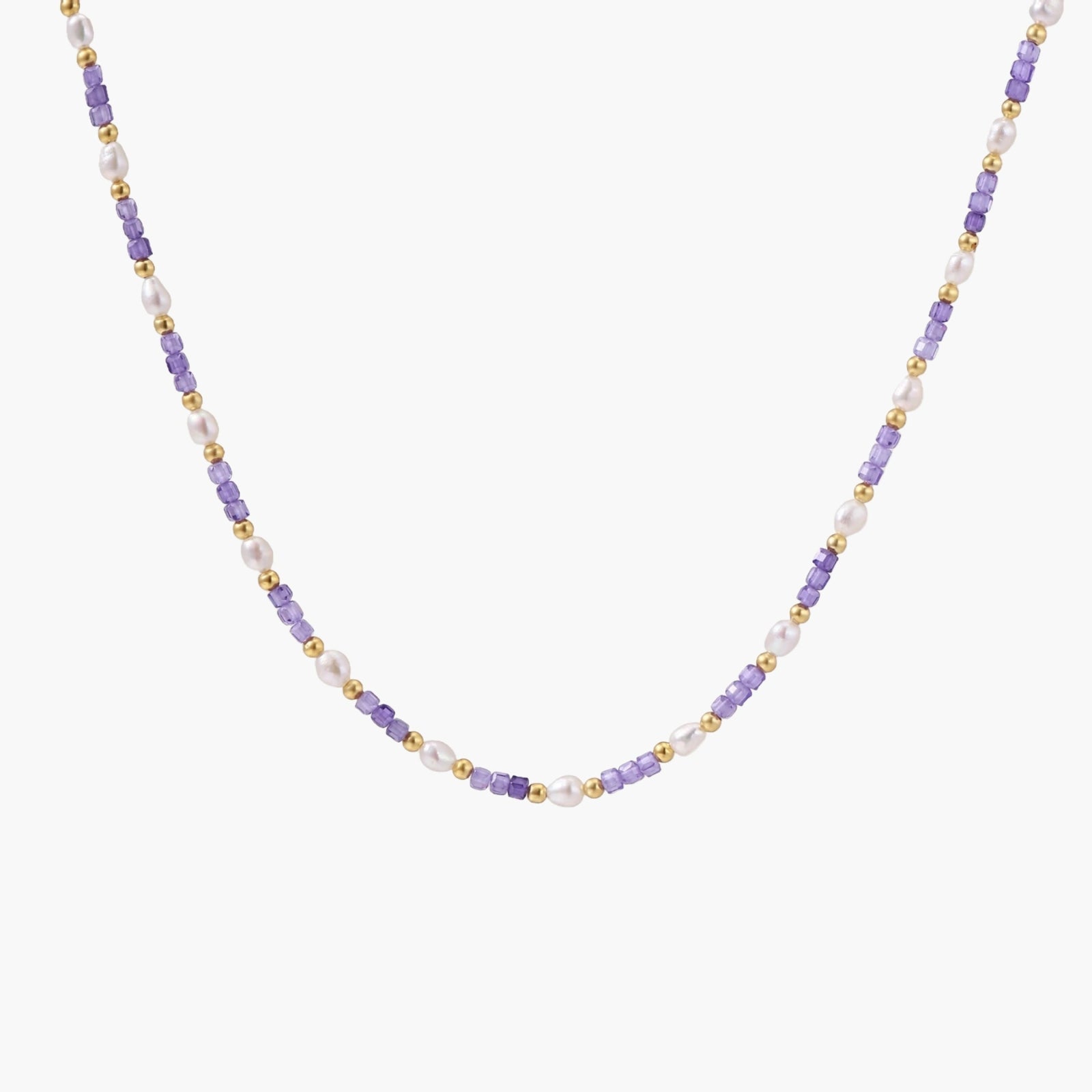 Delicate 18K gold vermeil necklace with alternating lavender zirconia beads and white freshwater pearls on cream background