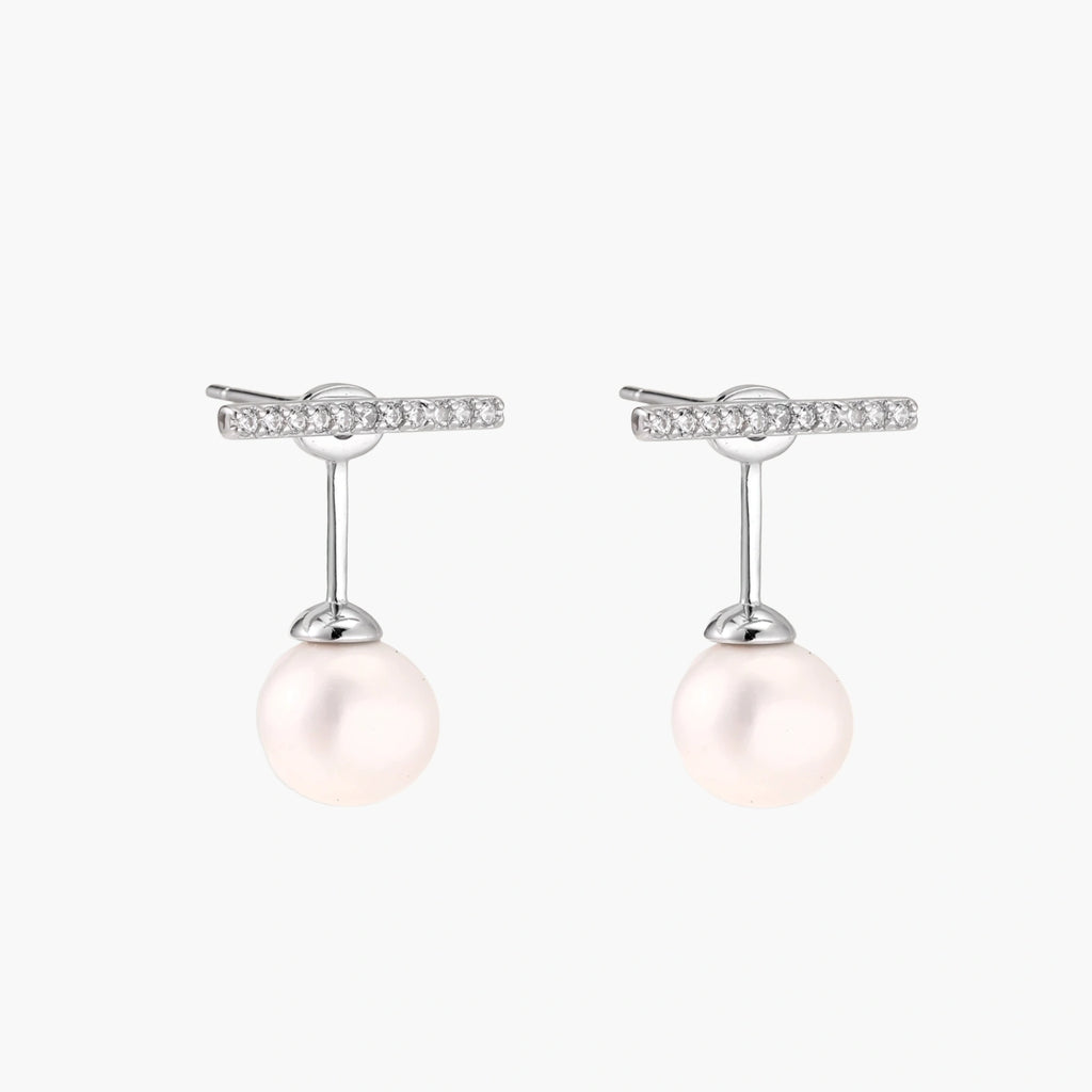 Rhodium-plated sterling silver ear jacket earrings with diamond-set horizontal bar and freshwater pearl drop