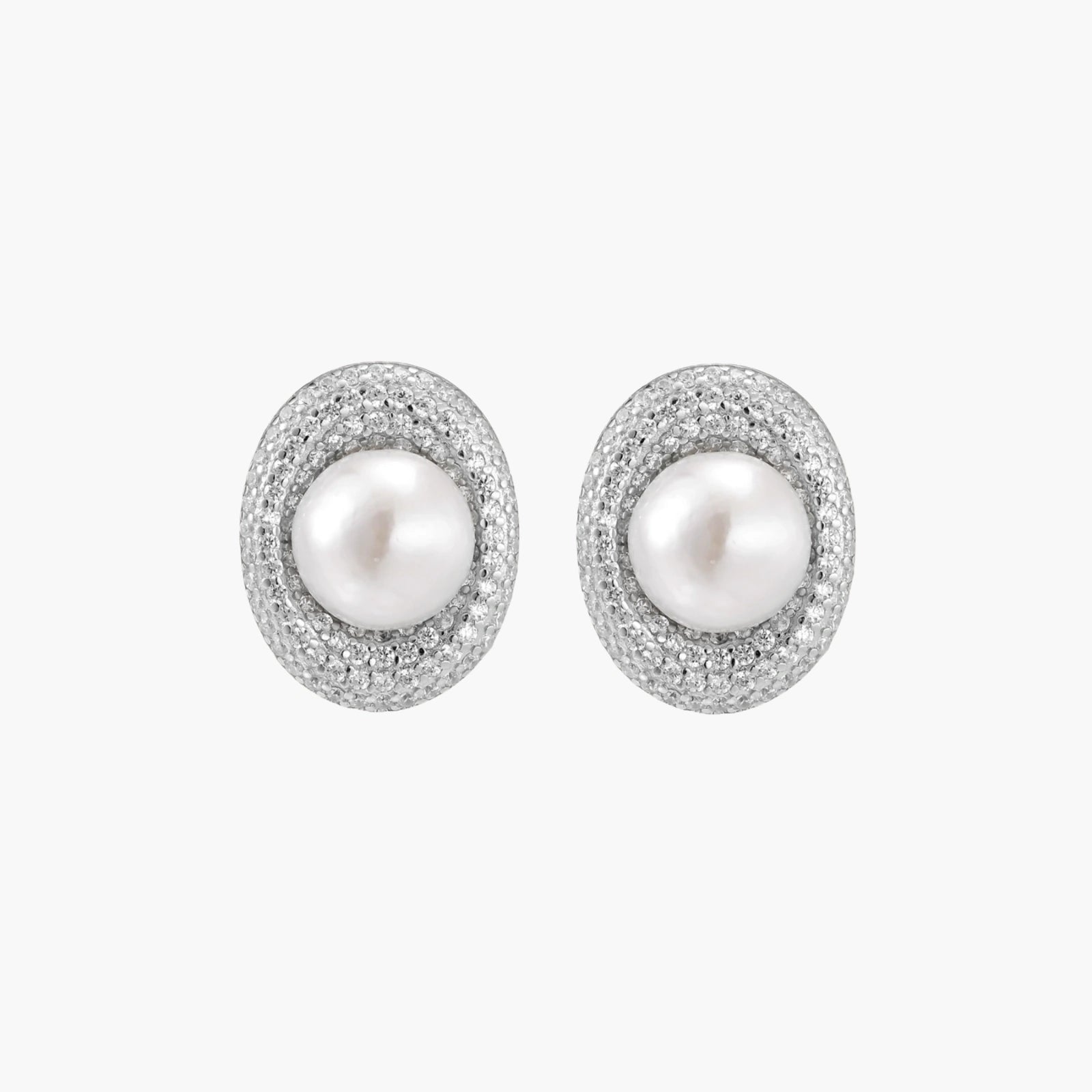 Elegant stud earrings with cream freshwater pearls surrounded by sparkly pavé crystals on rhodium-plated silver setting