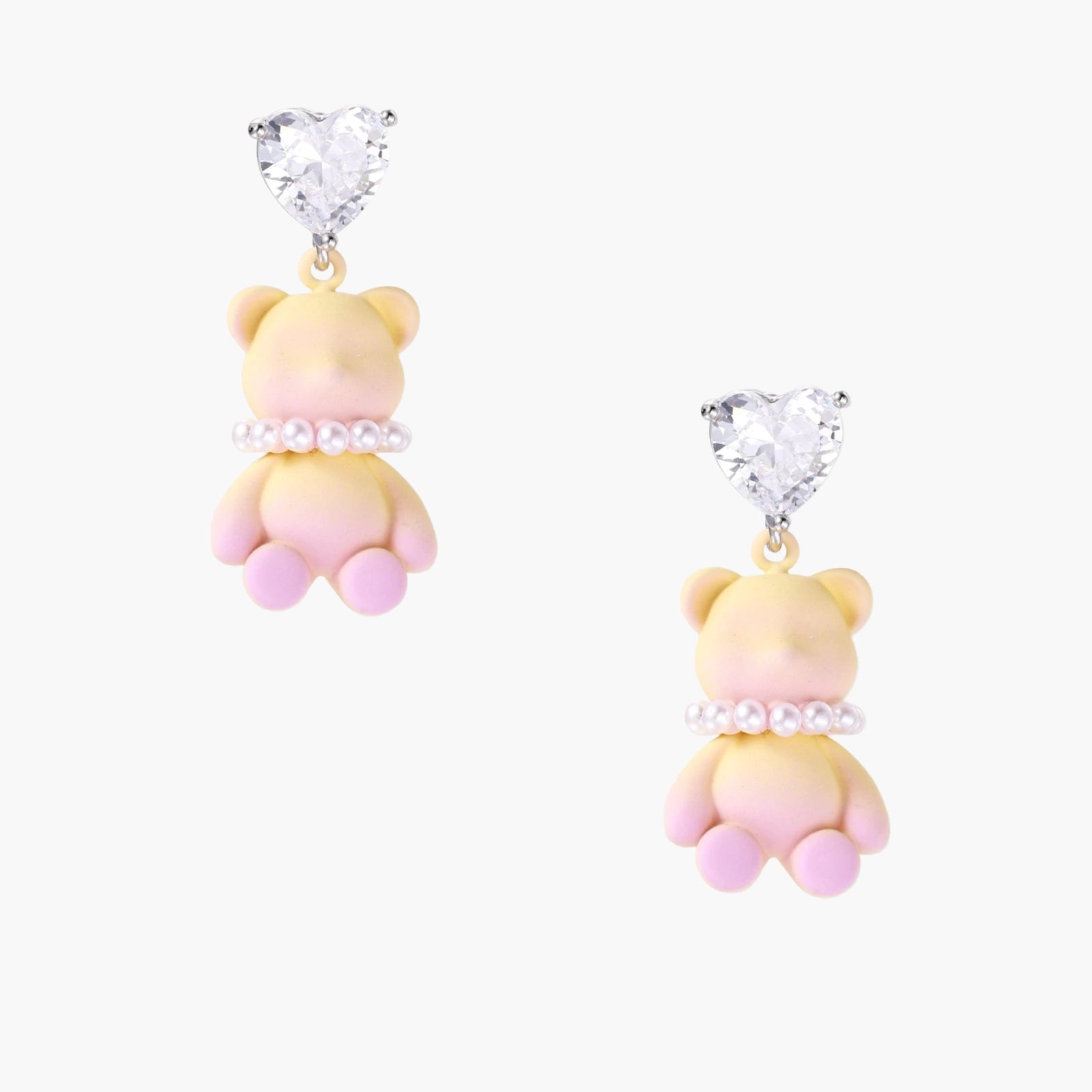 Dangle earrings with heart-cut zirconia studs and pastel teddy bear charms with pearl necklace details