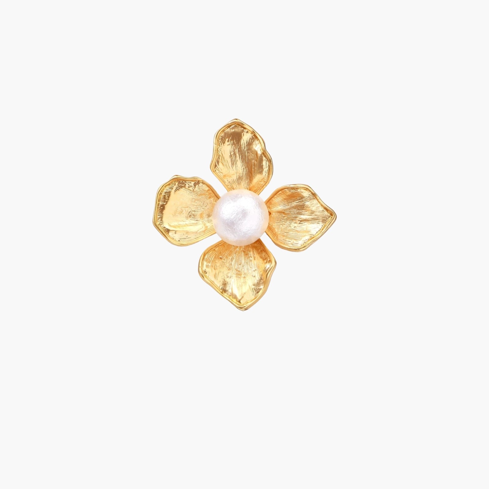 Gold-plated flower ring with textured petals and white cotton pearl center on cream background